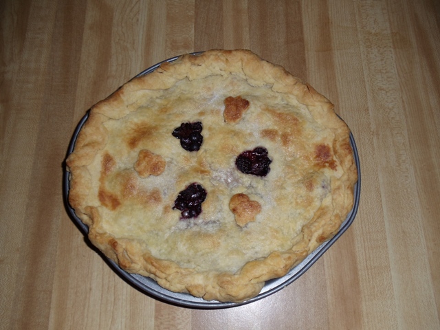 Black and Blue Pie cooling on counter